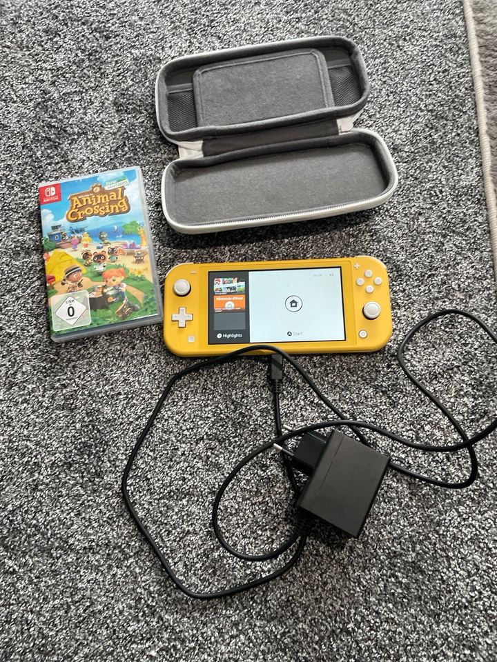 Nintendo Switch + Spiel + Ladekabel + Schutzhülle in Ratingen