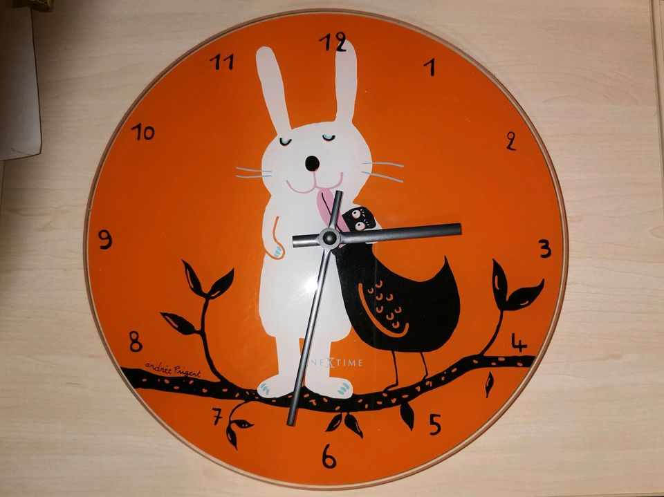 NeXtime Wanduhr, orange, André Prigent, Hase mit Ente in Bietigheim