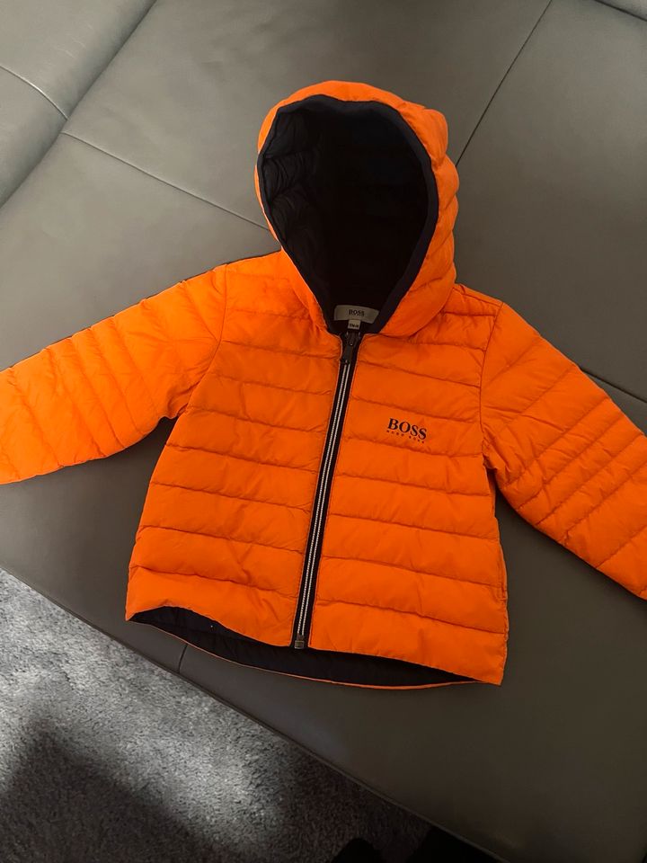 Unisex Daunenjacke orange 74 in Düsseldorf