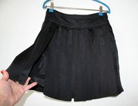 Mini Rock Schwarz mit Fransen aus Satin -BEBE Gr. 36 Friedrichshain-Kreuzberg - Friedrichshain Vorschau