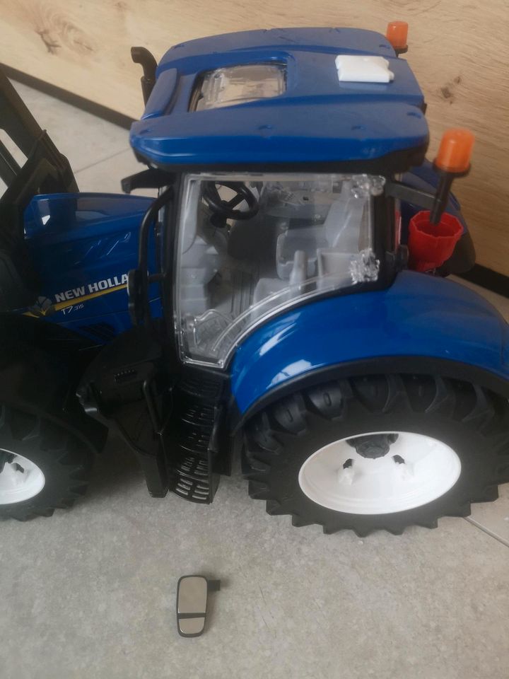 bruder Traktor New Holland T7. 315 mit Frontlader (03121) in Michendorf