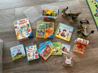 Kinderspielzeug Bücher, Rollschuhe, Puzzle, Steckteile, Hase hüpf Frankfurt am Main - Nieder-Erlenbach Vorschau