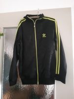 Schwarze Adidas Jacke mit grünen Streifen Pankow - Karow Vorschau