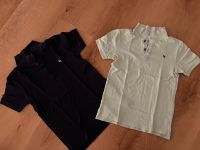 2 Poloshirts H&M dunkelblau und grün 134/140 Hessen - Hünfeld Vorschau