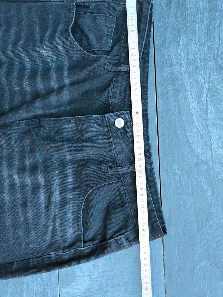 Schwarze Jeans in Größe XL mit Löchern in Haan