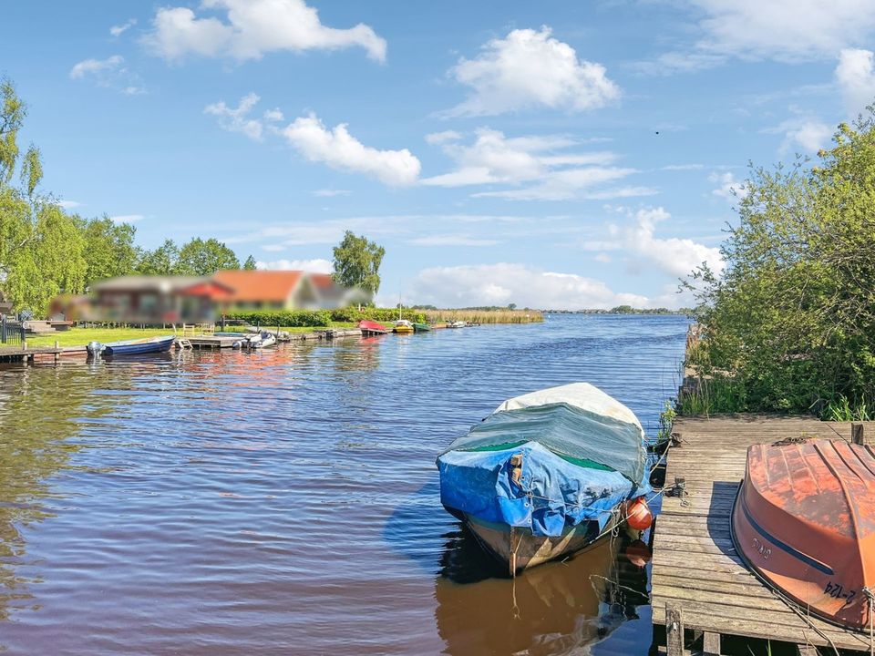 Meerbude € 129.000 direkt am Kleinen Meer mit Bootssteg und Boot mit Außenborder in Emden