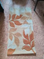 Orangener Teppich mit Blätter-Muster Sachsen - Schöpstal Vorschau