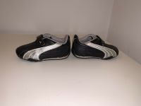 Puma Sneaker Turnschuhe Schwarz Silber Gr. 20 Niedersachsen - Jesteburg Vorschau