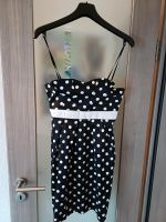 Rockabilly-Kleid schwarz mit weißen Punkten Sachsen - Lößnitz Vorschau