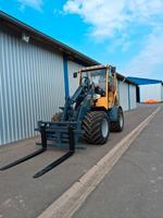 Anfrage stellen & Angebot sichern! ✅ Eurotrac W12CF-XL als Neumaschine kaufen ✅ Kabine, Sitz gefedert, Rückfahrkamera & Radio – Frontlader / Stalllader / Radlader mit Allrad / Multifunktionslader Mecklenburg-Vorpommern - Gnevkow Vorschau