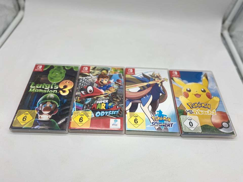 4x Nintendo Switch Spiele Mario Luigi Pikachu Pokémon Schwert in Marl