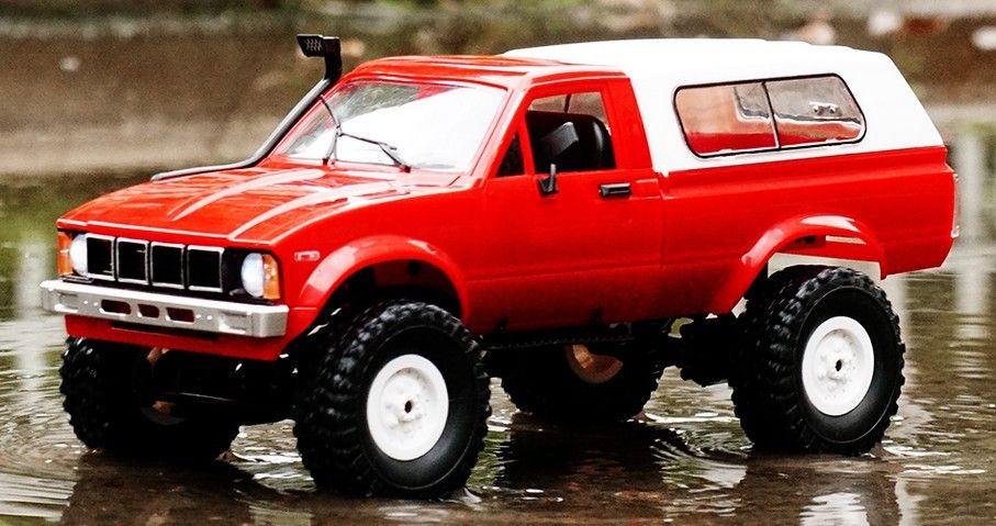 Toyota Hilux 1:16 rot 4x4 2.4GHz RC Pickup Truck OVP NEU in Cottbus