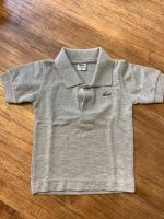 Lacoste Poloshirt Baby Gr. 92  grau Nordrhein-Westfalen - Paderborn Vorschau