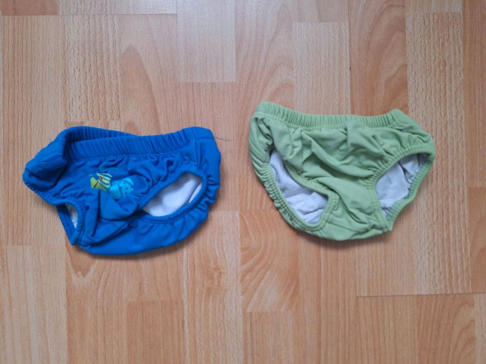 Baby Junge Gr. 74 Kleidungspaket Hose Badehose Shirts Schlafanzug in Tostedt