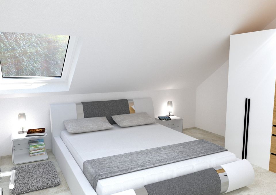Neubau trifft auf Holz: Exklusive Penthouse-Wohnung mit hohem Kom in Bad Krozingen
