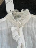 Zara Kurzarm Bluse weiss mit Rüschen Gr. xS Neu mit Etikett Kr. München - Ismaning Vorschau