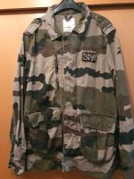 Military Denim Jeans Look Utility-Jacke mit Camouflage-Muster Nordrhein-Westfalen - Harsewinkel Vorschau