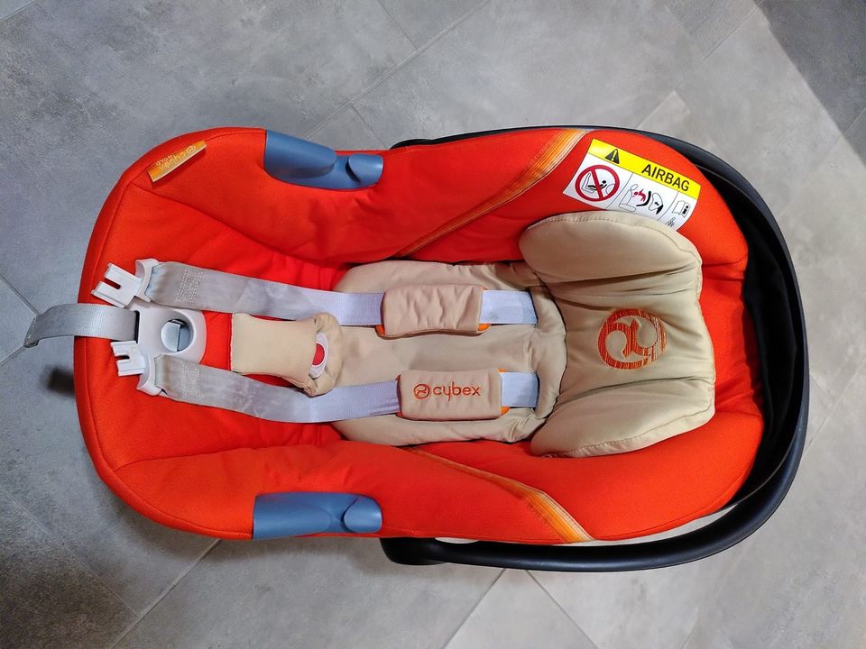 Maxi Cosi Alternative / Cybex Babyschale Atom I-Size in orange in Senden