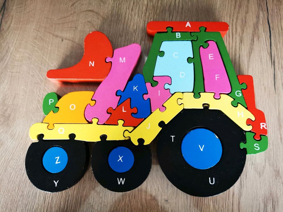 Holzpuzzle Traktor in Schwaara