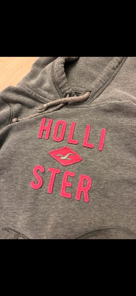 Hollister Hoodie Pullover XS Grau/Pink gut erhalten in Hemmingen