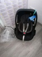 Babyschale Maxi Cosi Peppel mit Sitzverkleinerer + Regenschutz Rheinland-Pfalz - Haßloch Vorschau