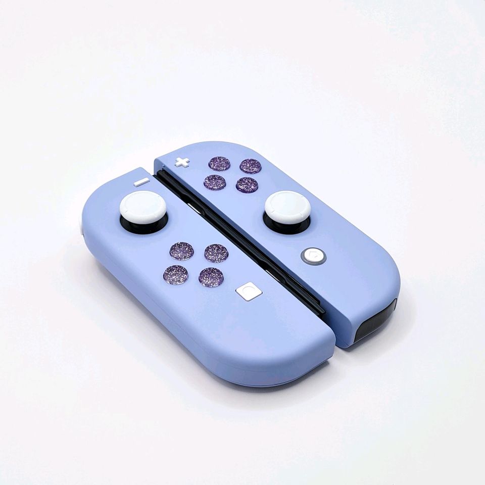 Lilane Nintendo Switch Joycons mit glitzernden Buttons in Heinsberg