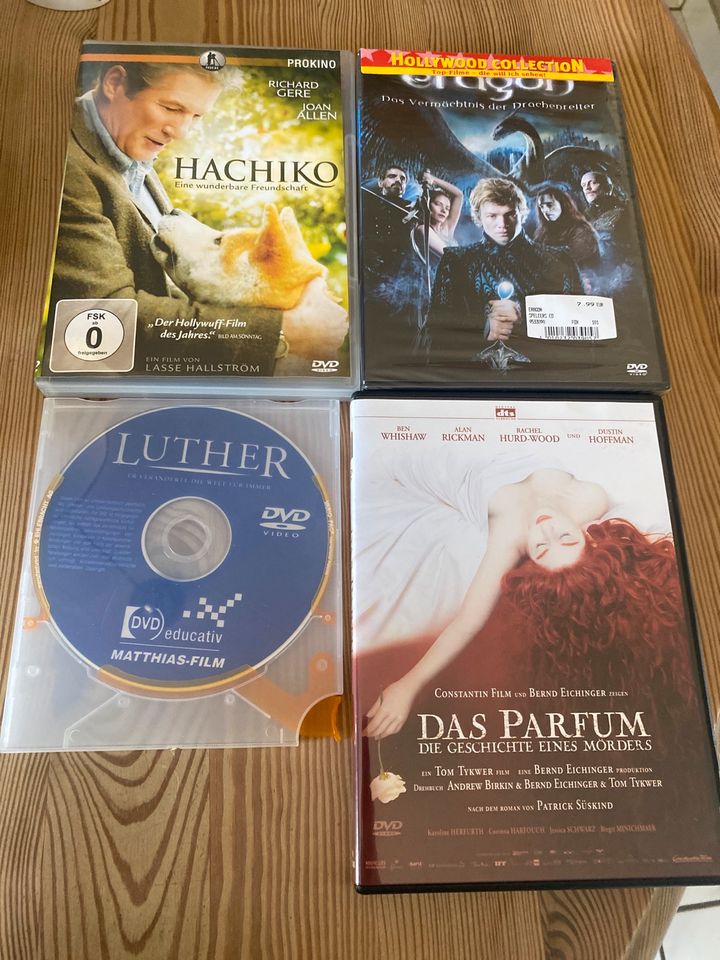 4 DVDs - Eragon (OVP), Luther, Hachiko, das Parfum in Idar-Oberstein