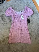 NEU NA-KD Naked Kleid rosa Flieder Blumen Rüschen Puffärmel 36 Niedersachsen - Osnabrück Vorschau