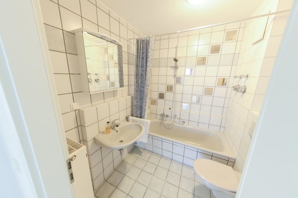 Idyllische 2-Zimmer-Wohnung im Hochparterre direkt am Neckar gelegen mit Tiefgaragenstellplatz in Heidelberg