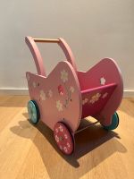 Puppenwagen aus Holz rosa m. Blumen u. Reifen in pink/türkis Baden-Württemberg - Gerlingen Vorschau