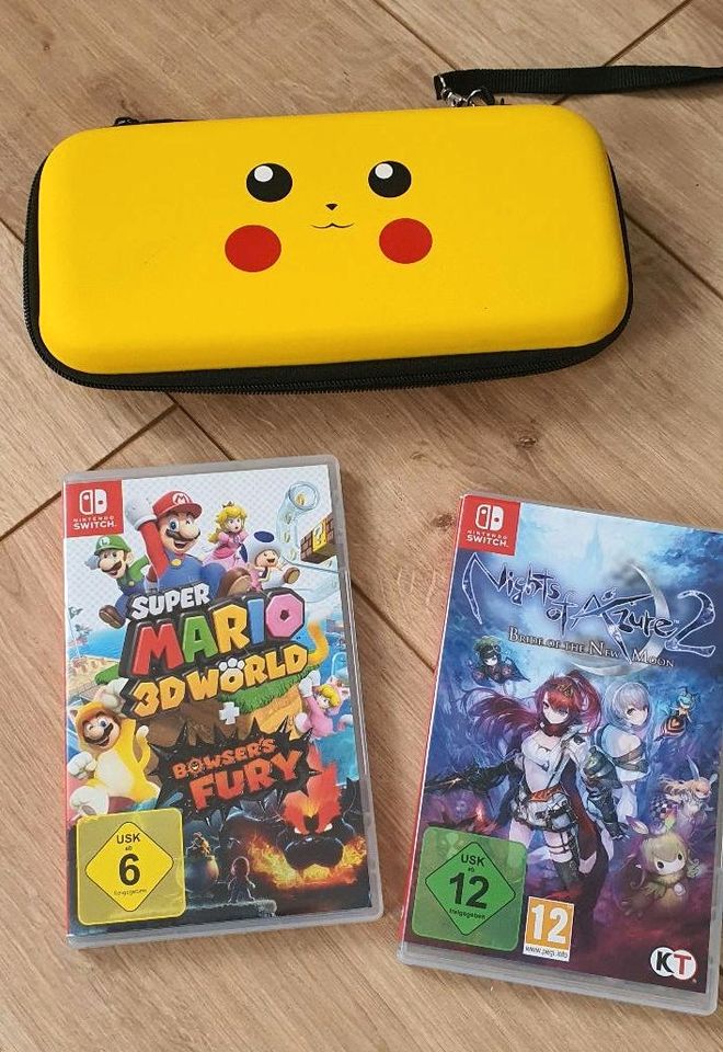 Nintendo Switch Lite + Pokemon Tasche + 2 Spiele in Otterwisch