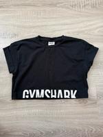 Schwarzes Gymshark Crop Top mit Logoprint am Saum Brandenburg - Glienicke/Nordbahn Vorschau