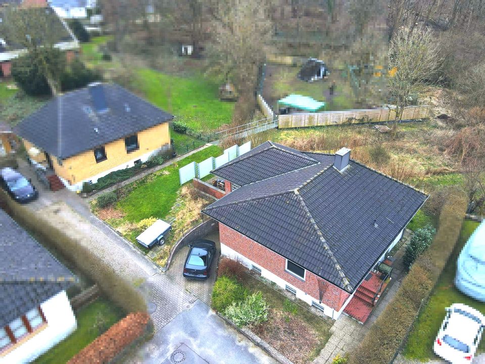 Kupfermühle: Hyggeliger Bungalow am Ende einer Privatstraße zu verkaufen in Harrislee