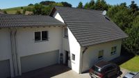 Mehrfamilienhaus inkl. Doppelgarage und Garten mit 1 und 2 ZKB-Wohnungen Rheinland-Pfalz - Langenbach Vorschau