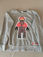 H&M Paillettenpullover Ninja Lego 122/128 Brandenburg - Eberswalde Vorschau