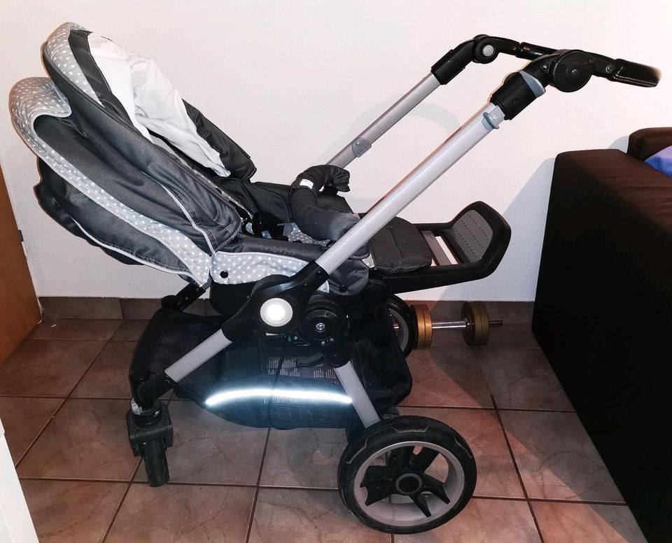 *Kinderwagen von Teutonia + Britax Römer  Babyschale +Autostation in Mauer