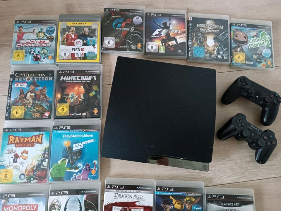 Playstation 3 + 2 Controller + 15 Spiele in Emmerthal