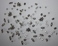 Konvolut Perlen über 100 Stück silberfarben verschiedene Motive Niedersachsen - Haselünne Vorschau