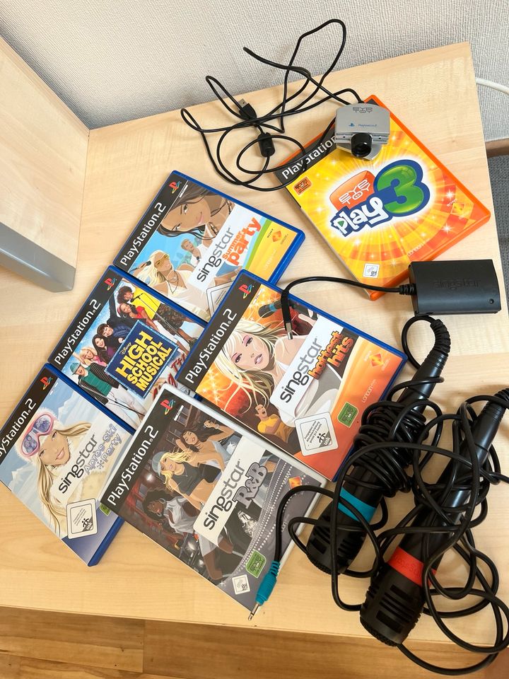 PlayStation 2 PS 2 mit verschiedenen Spielen Singstar EyeToy in Osnabrück