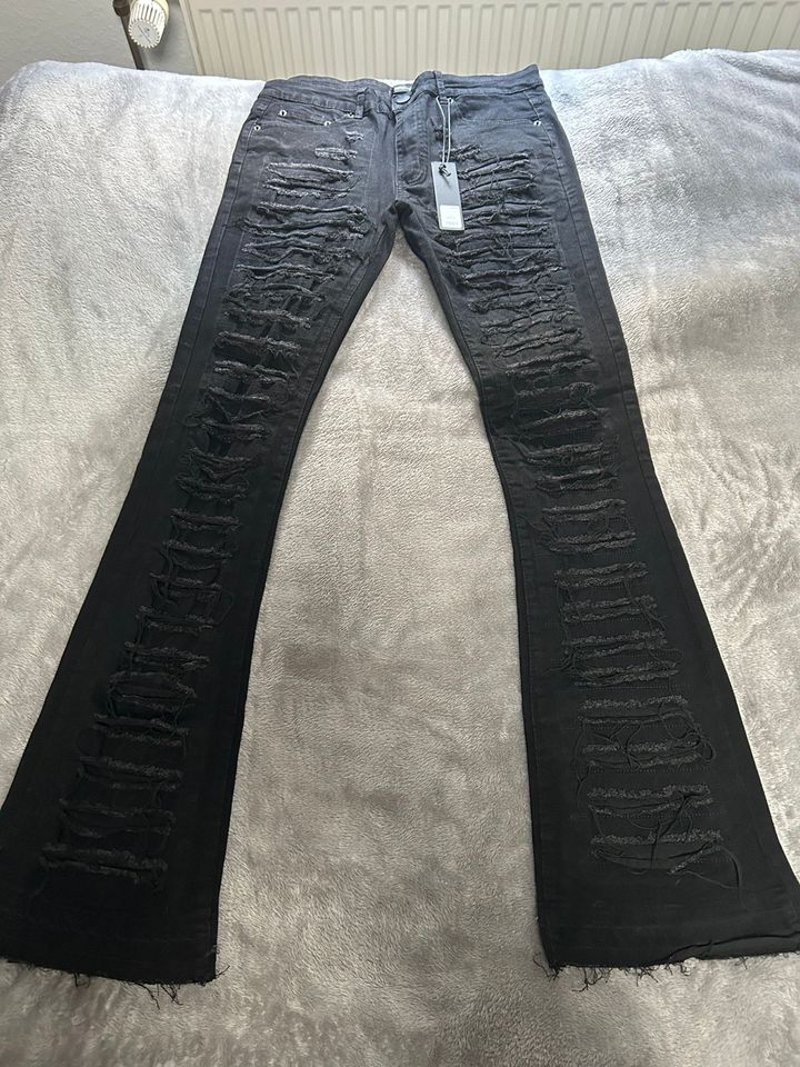 Flared Denim schwarz Gr 32 in Dorsten