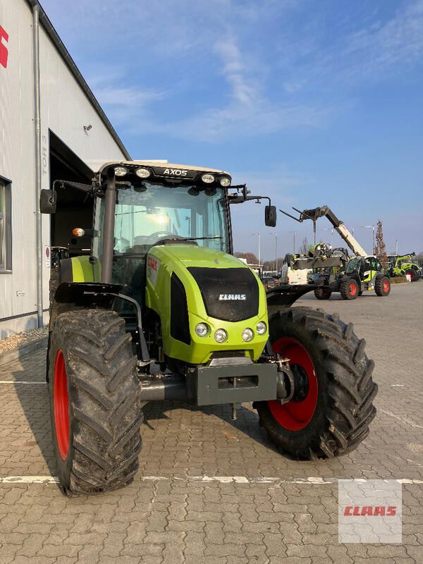 Claas AXOS 340 CX Traktor / 15679 in Puls