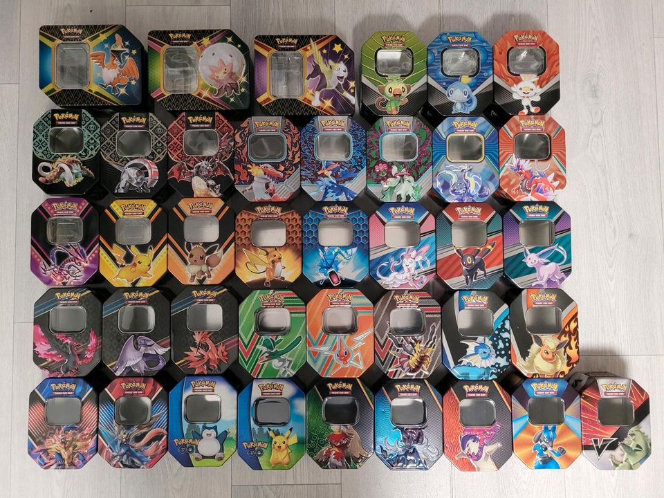 100 Pokemon Karten deutsch boosterfrisch + V ex Booster Holo Tin in Berlin