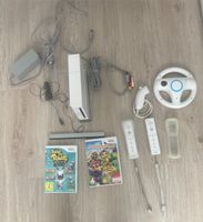 Wii +nunchuck und 2 spiele und mariokart lenkrad Baden-Württemberg - Sindelfingen Vorschau