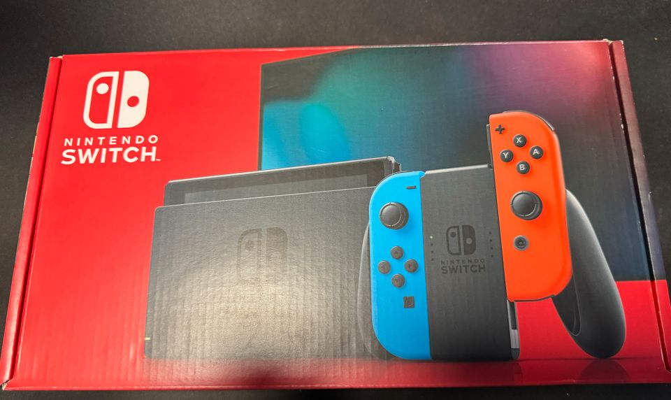 Nintendo Switch 2019 Upgrade Version (Neuwertig)+Spiel Blau/Rot in Bottrop