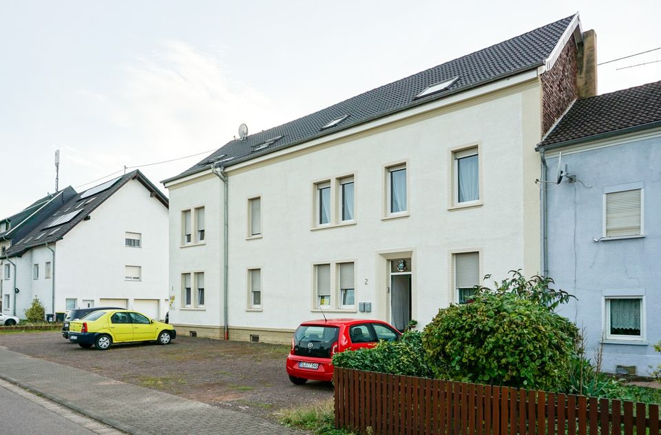 2 Mehrfamilienhäuser als Renditeobjekt mit insgesamt 5 Wohneinheiten und 4 Garagen in Ensdorf zu verkaufen in Ensdorf