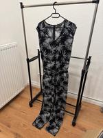 Neu Schwarzer langer Jumpsuit mit weißen Blättern Neustadt - Gartenstadt Süd Vorschau