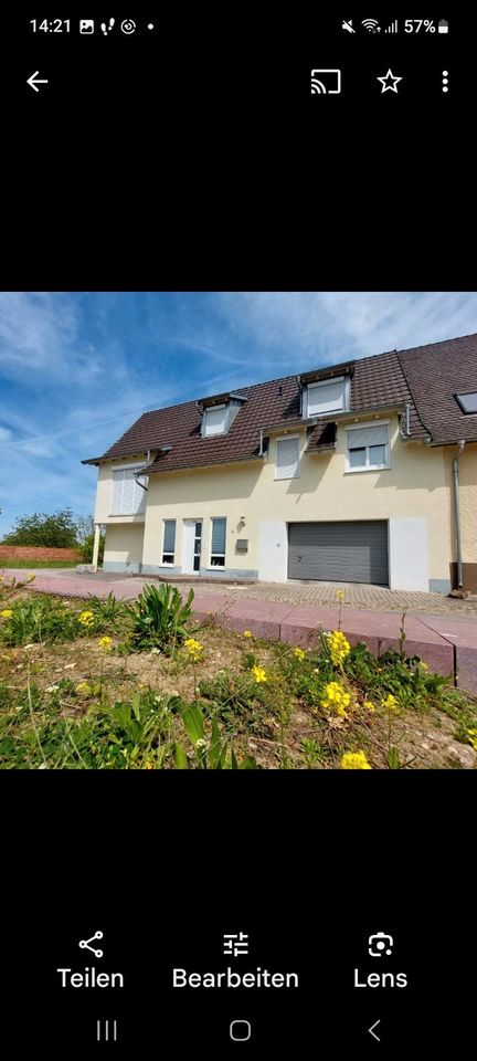 Wunderschön, individuell gestaltetes Haus mit traumhaften Garten in Neuenburg am Rhein