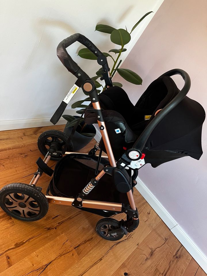 Kinderwagen+Babyschale in Neukamperfehn