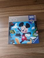 Puzzle Ravensburger - Disney Mickey Mouse 100 Jahre Disney - 300 Bayern - Lonnerstadt Vorschau