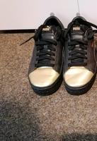 Puma Schuhe, Schwarz/Gold Köln - Meschenich Vorschau